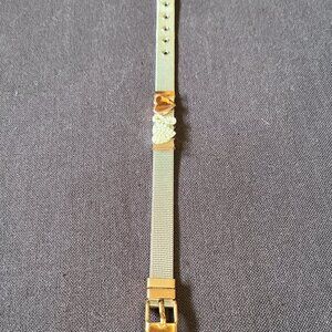 LA CN Woven Belt Style Slider Bracelet with three charms.